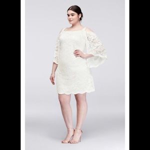 White floral lace gown. (Bridal)